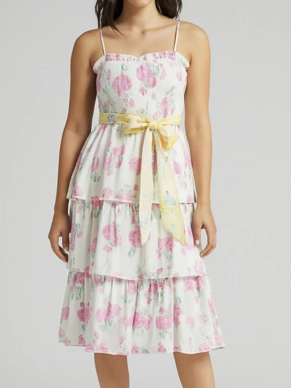 An elegant lady's small-sized white floral lace dress